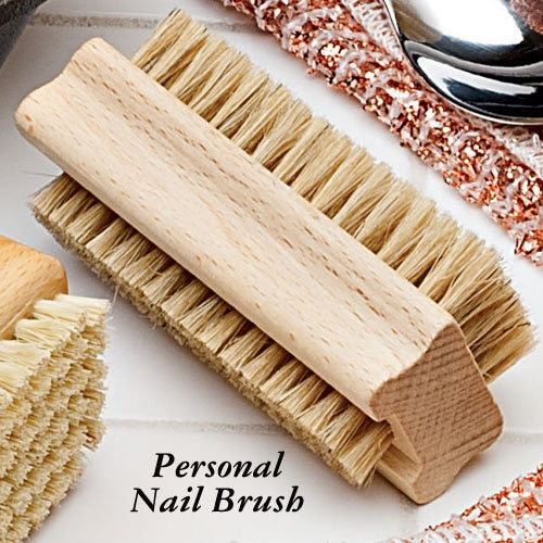 Nail brush for removing grime from fingers