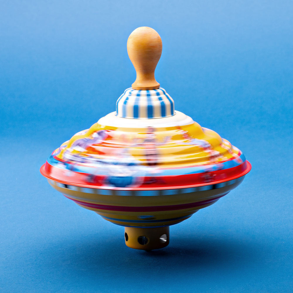 Push-Powered Humming Top