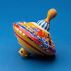 Push-Powered Humming Top