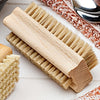 Nail brush for removing grime from fingers