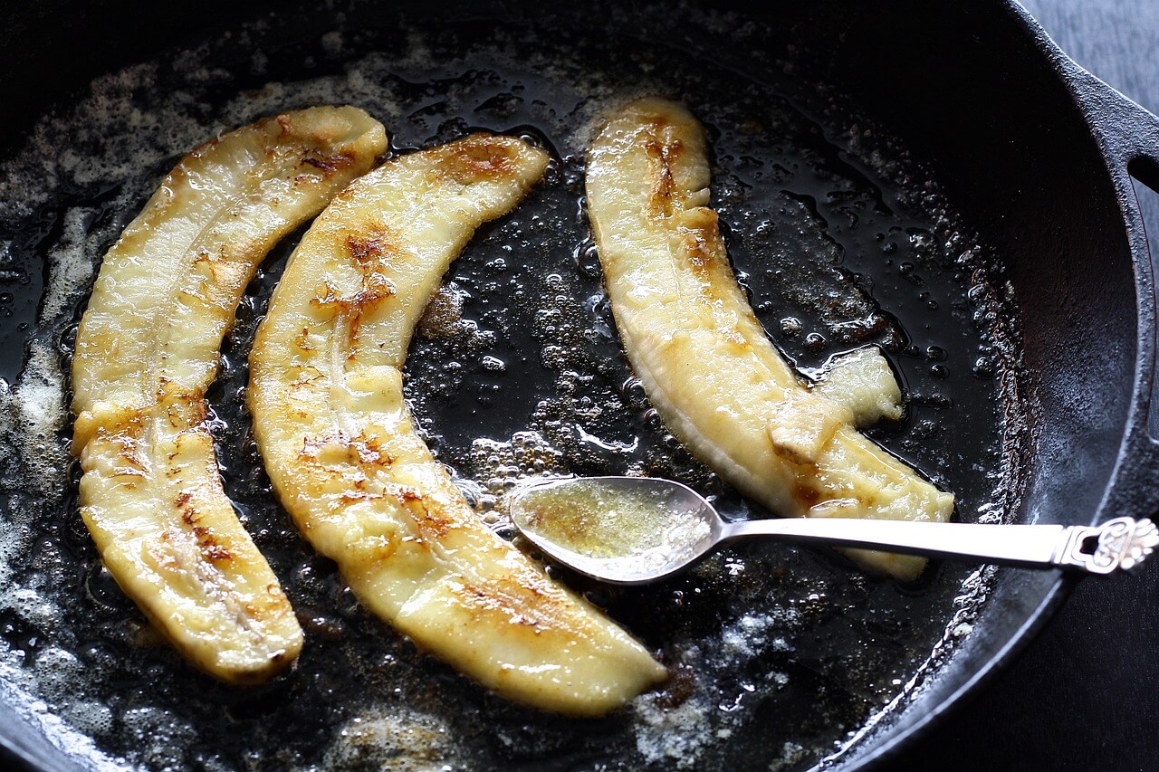 cast iron pan with caramelized bananas