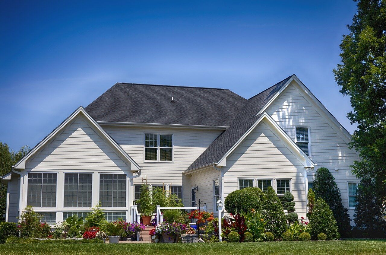 House with fruit trees planted outside